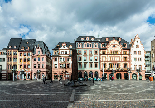 beautiful market place in Mainz, Germany. In the middle is the famous 1000 years old Heunensaeule made of sandstone.