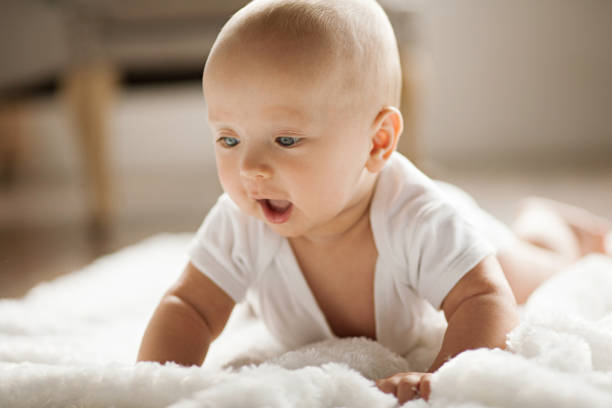istock Portrait of small surprised baby. 648774972