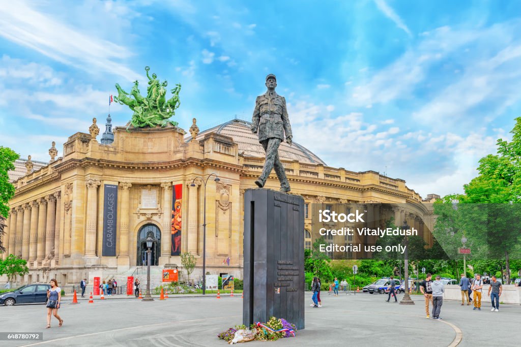 Statue General De Gaulle  on square with people, near Grand Palais  in Paris, France. Paris, France - July 01, 2016 :  Statue General De Gaulle  on square with people, near Grand Palais  in Paris, France. Elysee Palace Stock Photo