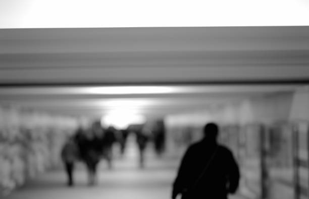 istock Man walking in metro bokeh background 648780968