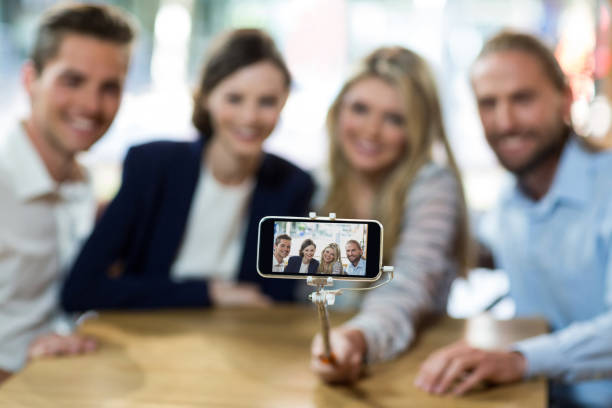 istock Happy friends taking selfie from mobile phone 648781008