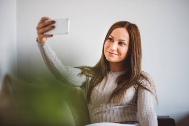 istock Women taking selfie at home 648781614