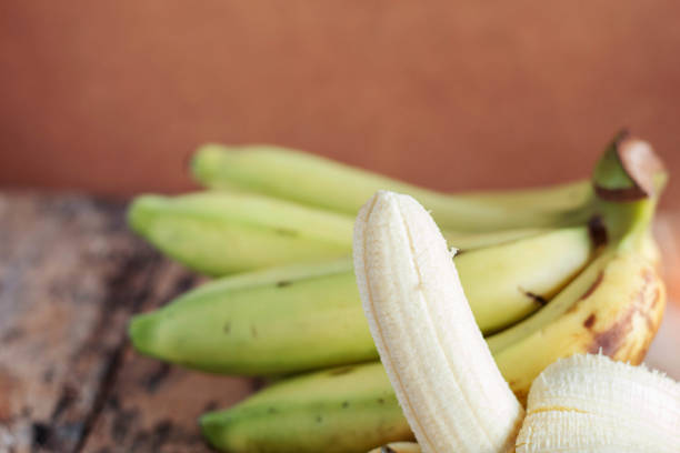 istock Banana peel on wooden. 648784790