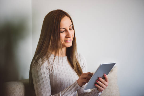 istock Women reading on the tablet 648785214
