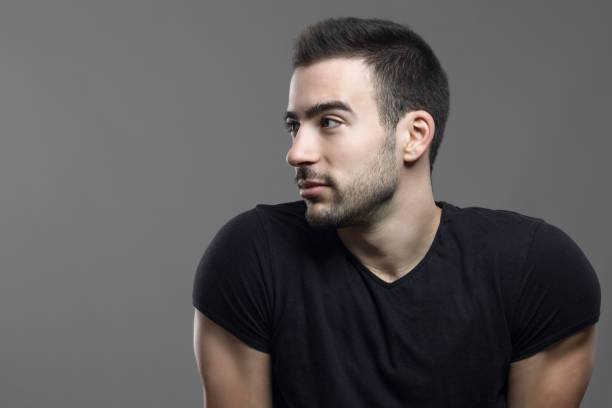 istock Handsome hunky man profile looking at copy space 648791744