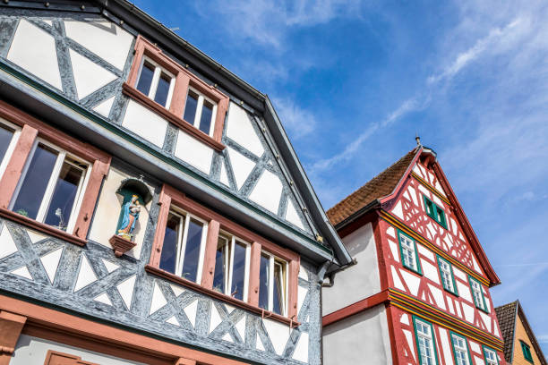 istock half timbered houses in Seligenstadt, Germany under blue sky 648793676