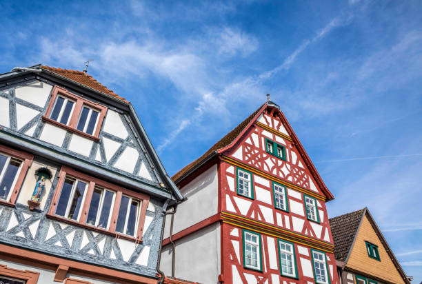 istock half timbered houses in Seligenstadt, Germany under blue sky 648794016