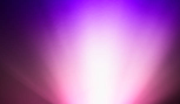 Bottom purple pink ray of light bokeh background stock photo