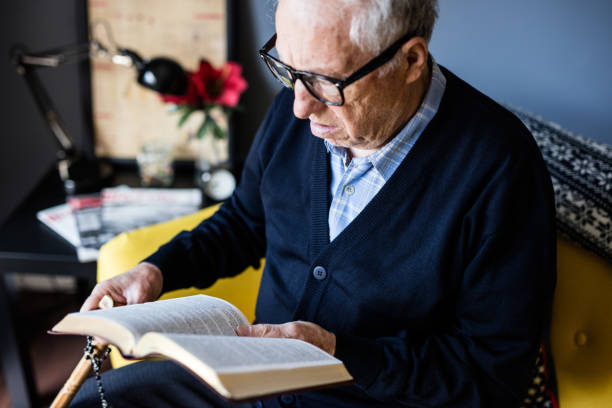 istock Elderly man reading the Bible 648799084