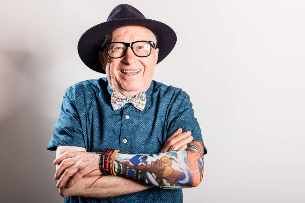 istock Happy senior man looking at camera and smiling, copy space 648800560