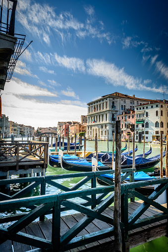 Gondolas or boats on Grand canal in beautiful town Venice