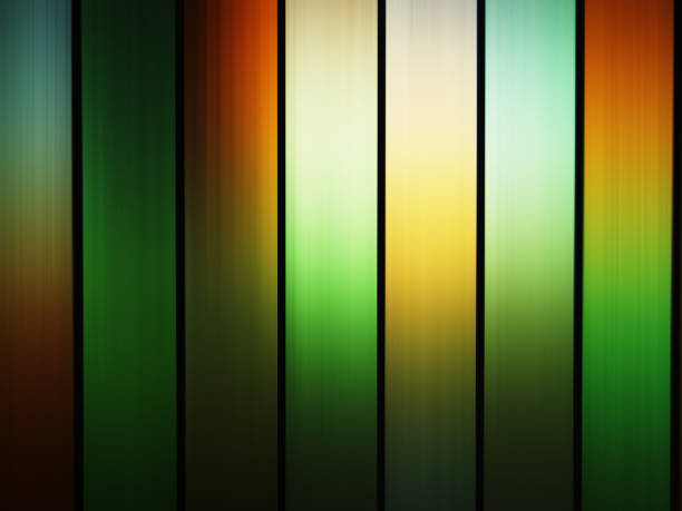 Vertical green and orange stained-glass window background Vertical green and orange stained-glass window background hd long shutter speed stock pictures, royalty-free photos & images