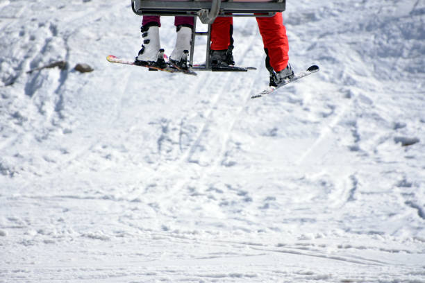 istock Riding the Chairlift at a Ski Resort 648810006