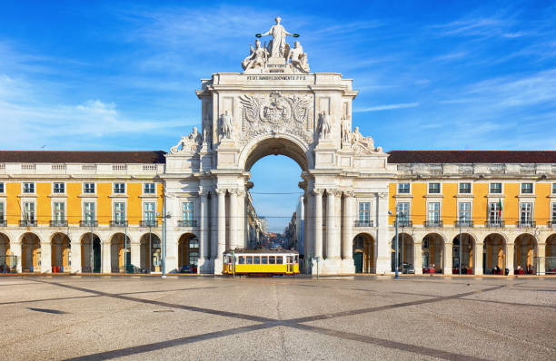 Praca do Comercio with yellow tram, Lisbon, Portugal stock photo