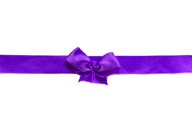 istock Purple ribbon with small cute bow isolated on white background , can use for decoration 648821528