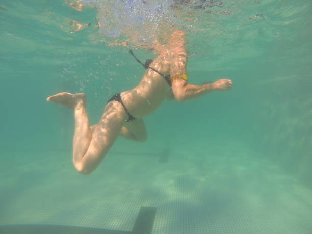 istock Woman under the water. 648825906