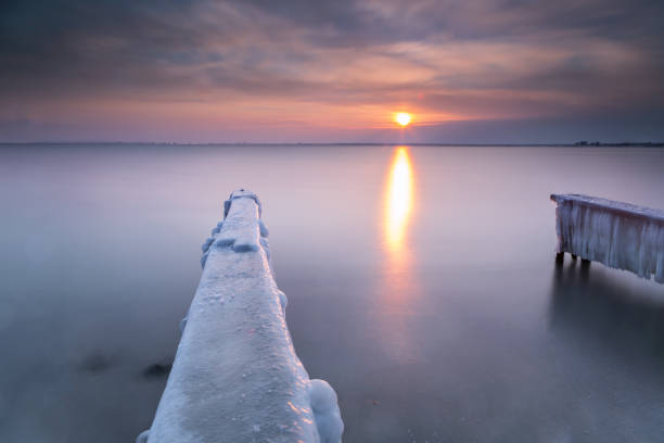 istock Pier covered with ice in winter 648825918