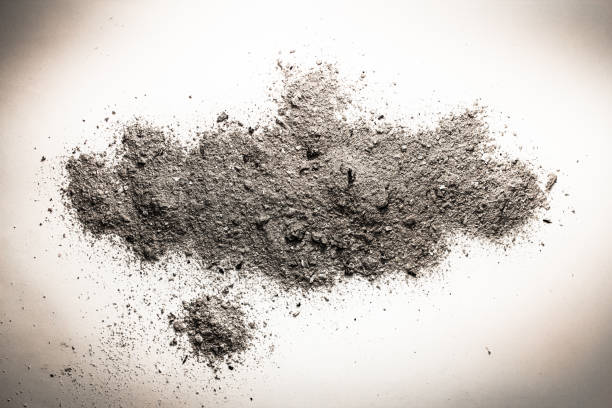 istock Ash, dust, sand or dirt on a pile as death, cremation remains, grey burnt trash concept 648828188