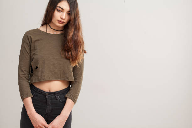 istock Young woman on gray background 648839962