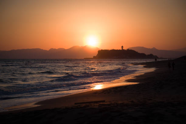 Sunset view on Inamuragasaki beach, Kanagawa, Japan stock photo