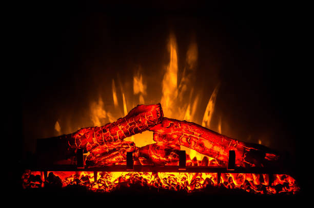 istock Electric fireplace with orange and yellow fire flame 648850338