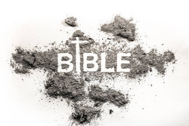 istock Bible word written in grey ash 648850402