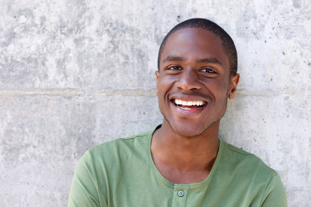 istock handsome young african american man smiling 648856224