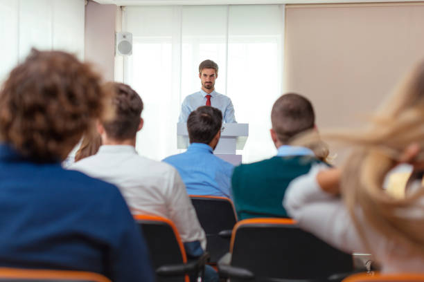 istock Young businessman explaining stock market performance on conference 648857744