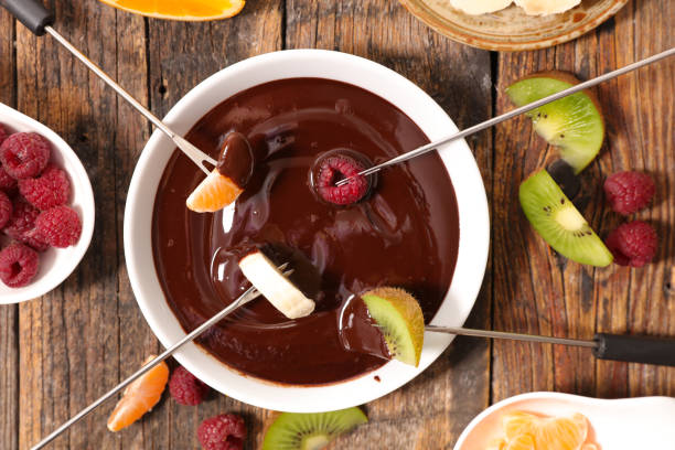 istock chocolate fondue with fruits 648869074