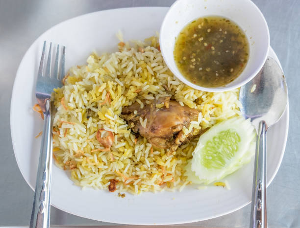 istock Rice with curried chicken biryani 648880354