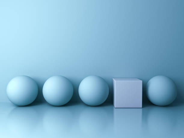 istock Stand out from the crowd and different creative idea concepts , One white square box standing among blue spheres on blue background in the row with reflections and shadows 648892454