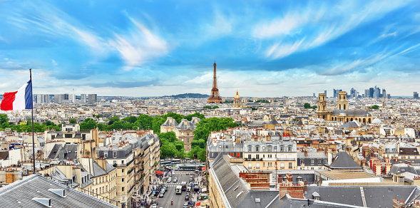 Paris, France - July 05, 2016 : Outdoor view  of beautiful panoramic view of Paris from the roof of the Pantheon.  View of the Eiffel Tower and flag of France.