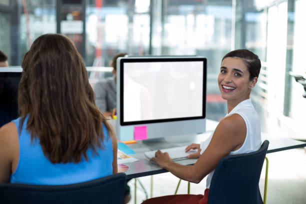 istock Portrait of female graphic designer working on personal computer 648912938