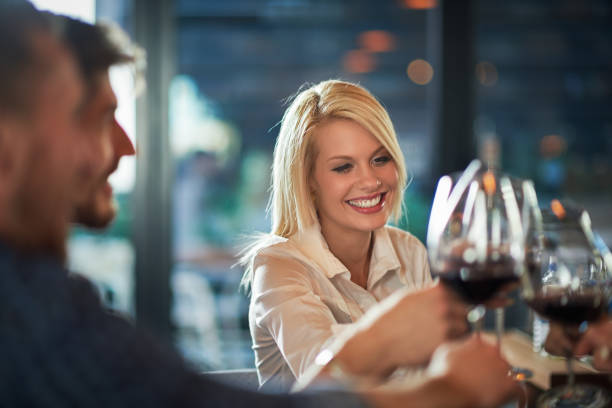 istock People celebrating in the restaurant 648916888