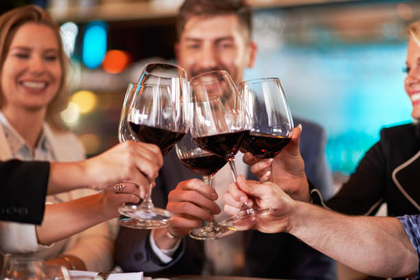 istock People celebrating in the restaurant 648917746