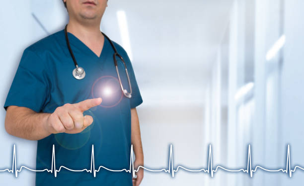 istock Doctor shows on viewer with heart rate template concept 648923098