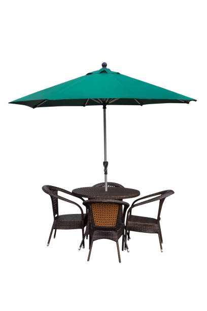istock Table, chairs and umbrella outdoors isolated 648927674