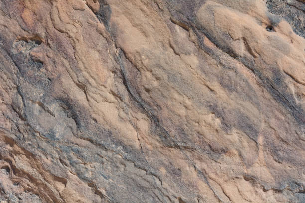 istock Textured surface of colorful rock 648927776
