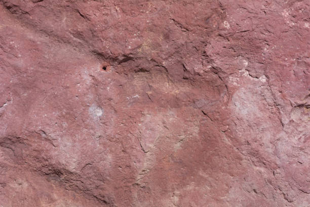 istock Textured surface of colorful rock 648934598