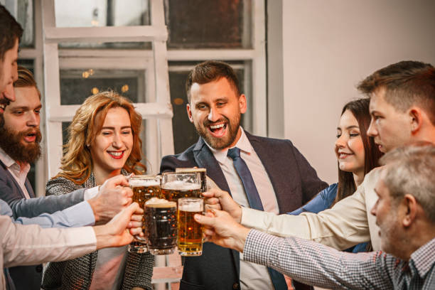 istock Group of friends enjoying evening drinks with beer 648938208
