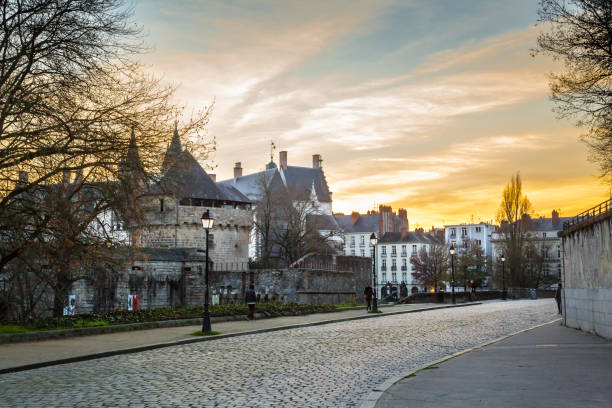 Sunset over old town in Nantes, France stock photo