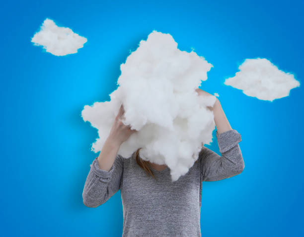 Woman with head in the clouds