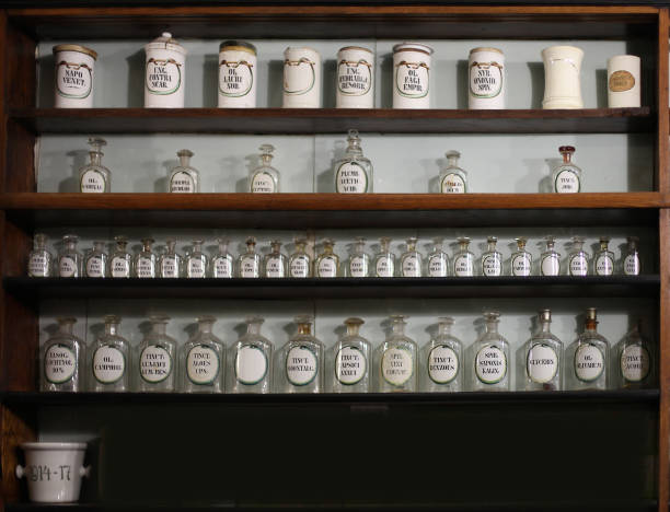 istock Shelves with medicines in retro pharmacy 648943102
