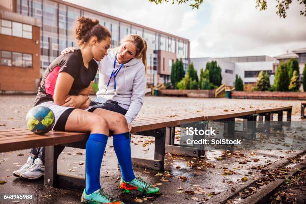 Supporting Her Rugby Players Stock Photo - Download Image Now - Athlete, Coach, Teenager