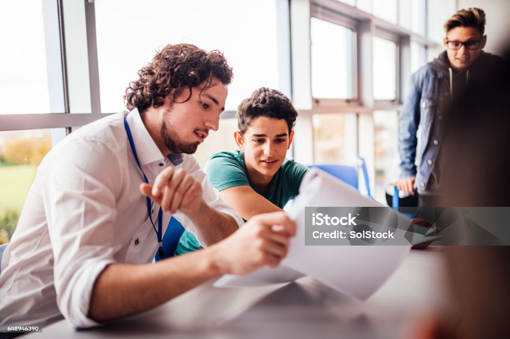 Understanding School Work Great School Work Stock Photo - Download Image Now - Teenager, Teacher ...