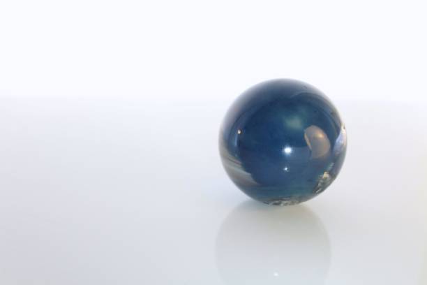 istock Blue Gem Stone Ball Isolated on White Background 648957706