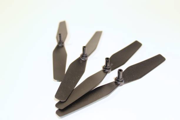istock Spare Drone Propellers and Parts Isolated 648957744