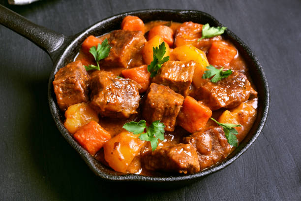 istock Stewed beef with potatoes and carrots 648960324