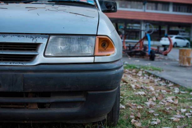 Detail of old car with headlight.