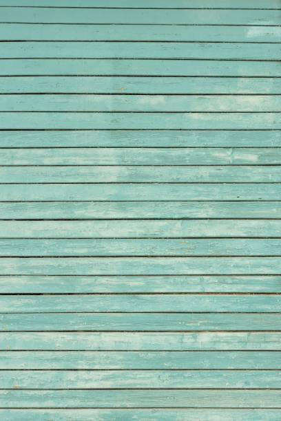 istock Old shabby wooden wall painted light blue 648961478